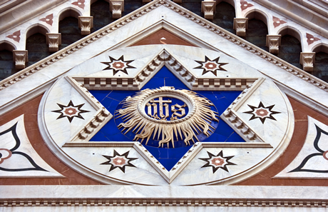 Star above the entrance of basilica di santa croce in Florence photo